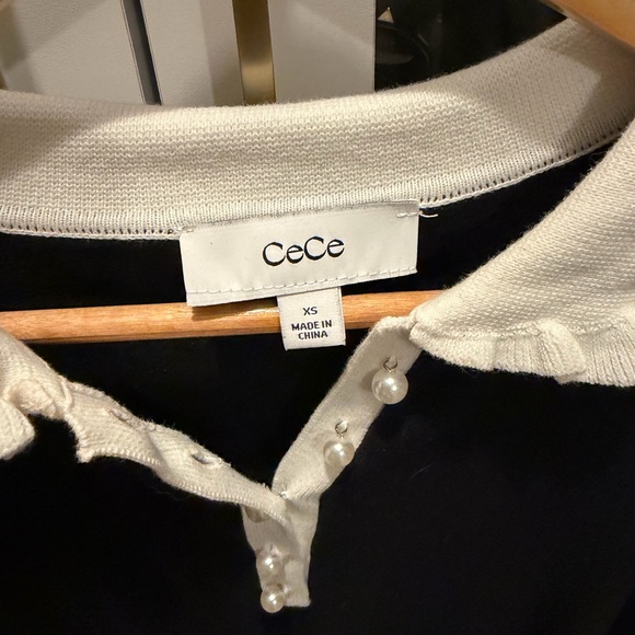 CeCe Black Top with White Ruffle Details - Picture 5 of 6